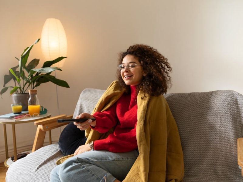 medium-shot-woman-holding-remote-min-(c).jpg